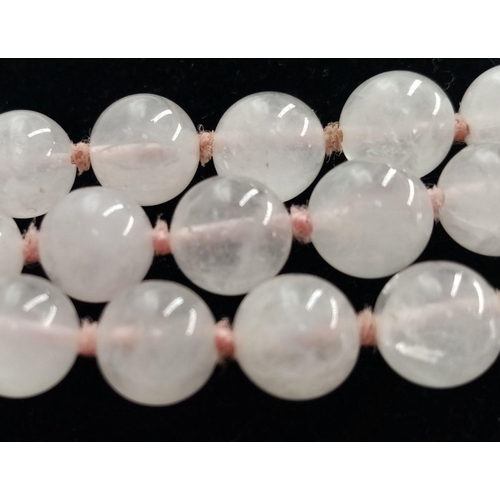 1291 - A Vintage Rope Length Rose Quartz Necklace. 8mm beads. 122cm length.