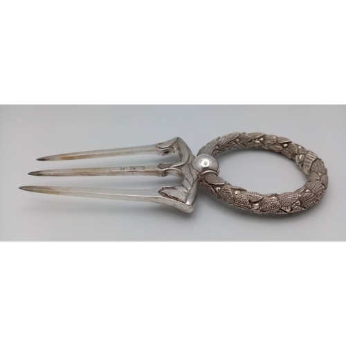 1306 - An Antique Silver Plated Bread/Toasting Fork. Markings of E.M.R. 13cm length.