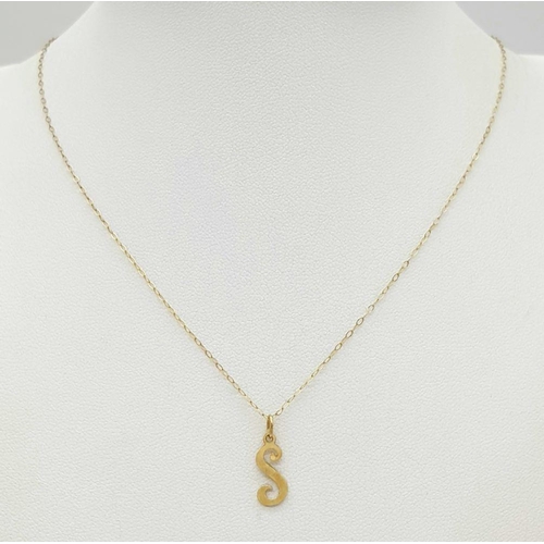 989 - A 9K 'S' Initial Pendant on a 9K Yellow Gold Disappearing Necklace. 12mm and 40cm. 0.65g total weigh... 