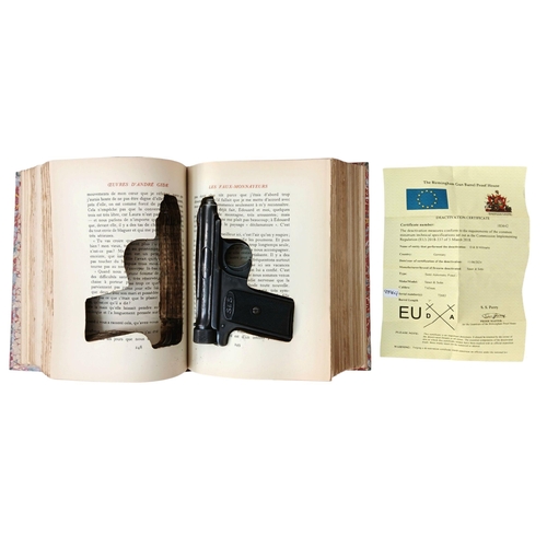 83 - A Late 1920’s-early 1930’s French book with cut out pages hiding a German 1913 Model Saur & Sohn 7.6... 