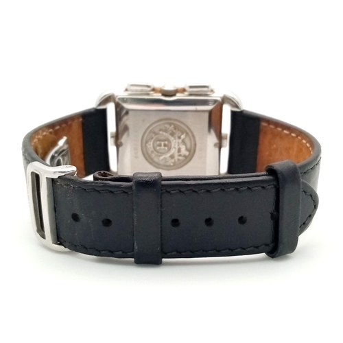 169 - A Hermes Chronograph Gents Tank Watch. Black leather strap. Stainless steel tank case - 31mm width. ... 