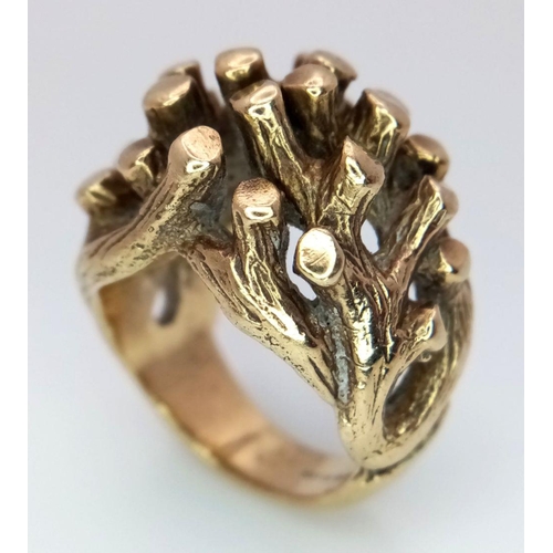 22 - An Abstract 9K Gold Heavy Ring. Foliage-esque design. Size K 1/2. 16.9g weight.