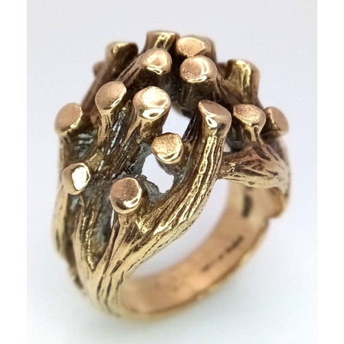 22 - An Abstract 9K Gold Heavy Ring. Foliage-esque design. Size K 1/2. 16.9g weight.