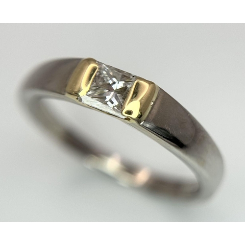 275 - An 18K White and Yellow Gold, Diamond Solitaire Ring. A 0.43ct (approx) Princess cut diamond sits be... 