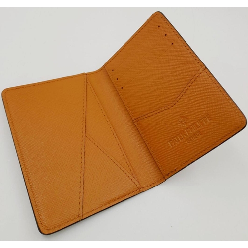 327 - An Unused Tan Leather Card and Money Wallet by the Renown Watch Maker Patek Philippe. 8 x11.5cm Fold... 