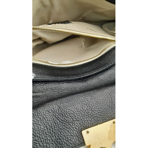 535 - A Chloe Black Leather Large Clutch Bag with Twist Clasp. Unfortunately the interior needs to be rest... 