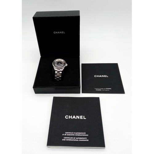 65 - A Chanel J12 GMT Gents Automatic Watch. Stainless steel bracelet and case - 41mm. Two tone grey meta... 