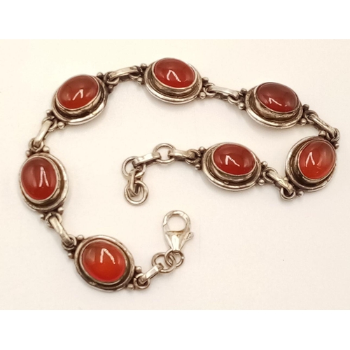 739 - A Vintage Sterling Silver Carnelian Cabochon Bracelet. 20.5cm Full Length. 17.24 Grams.