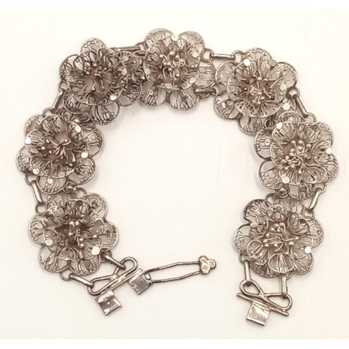 873 - A Vintage or Older Silver Filigree Flower Design Bracelet-17cm Length. 13.65 Grams.