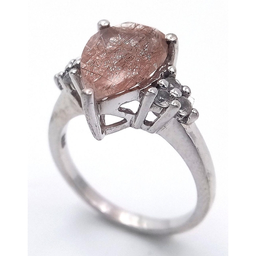 1048 - A Sterling Silver Pear Cut Rutilated Quartz and White Sapphire Set Ring Size N. The Ring Measures 1.... 