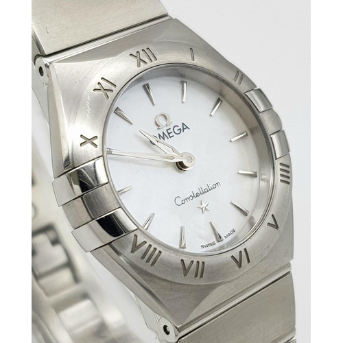 148 - An Omega Constellation Quartz Ladies Watch. Stainless steel bracelet and case - 26mm. Mother of pear... 