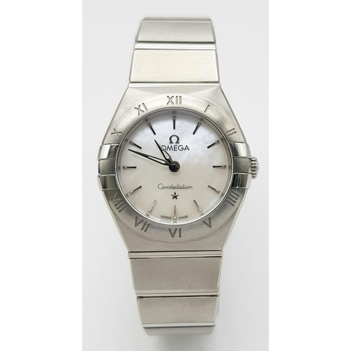 148 - An Omega Constellation Quartz Ladies Watch. Stainless steel bracelet and case - 26mm. Mother of pear... 