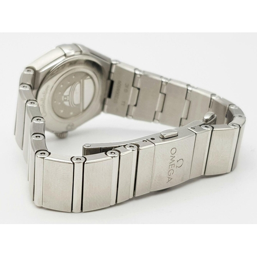 148 - An Omega Constellation Quartz Ladies Watch. Stainless steel bracelet and case - 26mm. Mother of pear... 