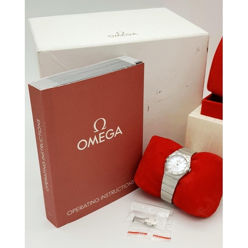 148 - An Omega Constellation Quartz Ladies Watch. Stainless steel bracelet and case - 26mm. Mother of pear... 