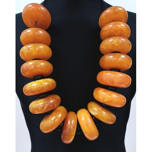 1496 - A Large Yellow Berber Resin Necklace. 905g total weight.