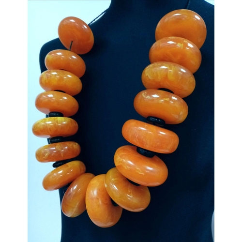 1496 - A Large Yellow Berber Resin Necklace. 905g total weight.