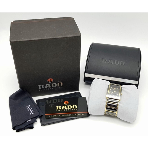 156 - A RADO DIASTAR WATCH, CERAMIC AND GOLD TONE BRACELET AND CASE, COMES IN ORIGINAL BOX AND PAPERS AND ... 