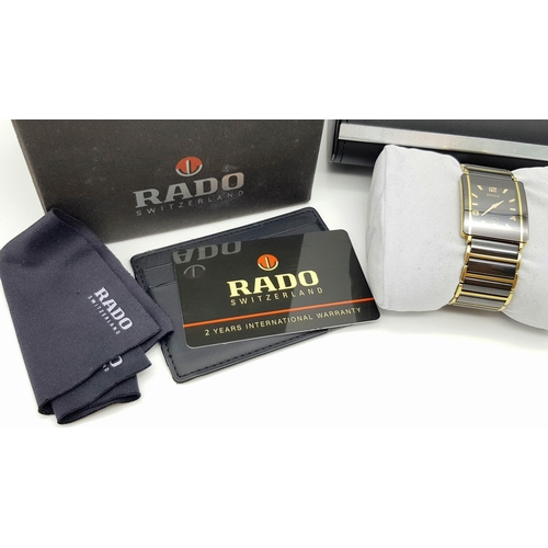 156 - A RADO DIASTAR WATCH, CERAMIC AND GOLD TONE BRACELET AND CASE, COMES IN ORIGINAL BOX AND PAPERS AND ... 