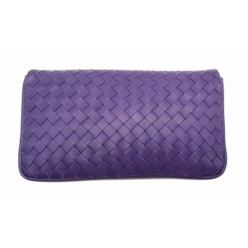 164 - A Bottega Venetta Purple Leather Pouch. Soft quilted leather with a brushed metal clasp. Soft textil... 