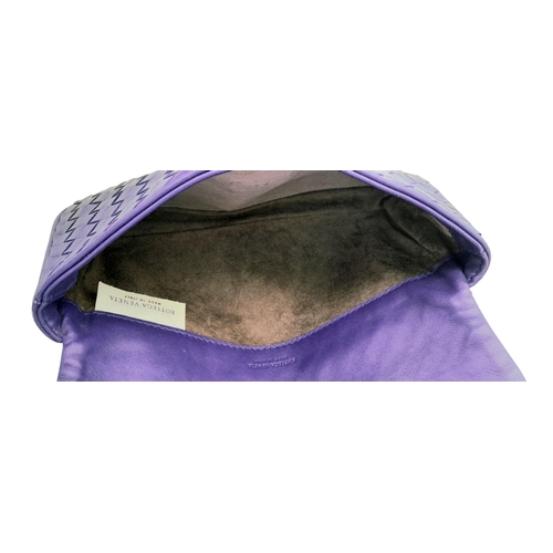 164 - A Bottega Venetta Purple Leather Pouch. Soft quilted leather with a brushed metal clasp. Soft textil... 