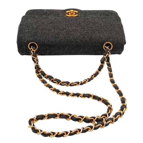 18 - A Chanel Grey Wool Small Double Flap Bag. Grey wool exterior with gold-toned hardware, featuring cha... 