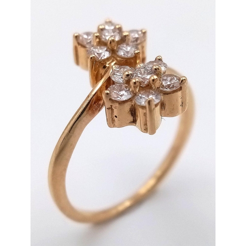 184 - A 14K YELLOW GOLD DOUBLE FLOWER CLUSTER TWIST DIAMOND RING, 0.50CT DIAMONDS APPROX, 3.6G SIZE L. Ref... 