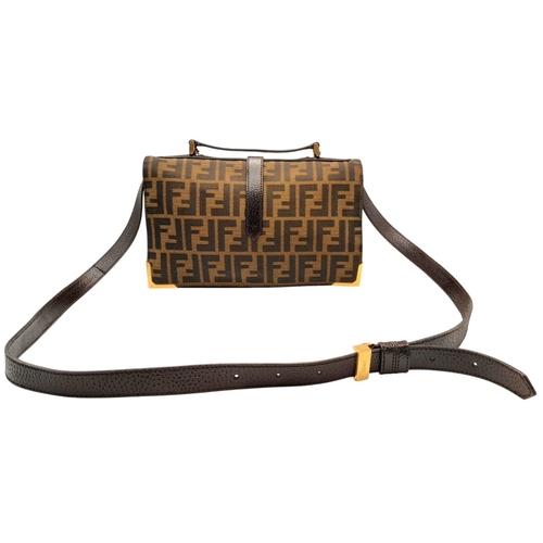 269 - A Fendi Zucca Print Bag. Canvas and leather exterior with gold-toned hardware and twist-lock closure... 