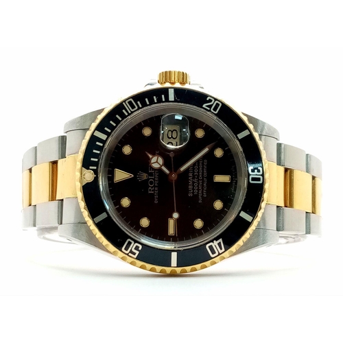 31 - A Superb Rolex Submariner Automatic Gents Watch. Bi-metal (gold and stainless steel) bracelet and ca... 