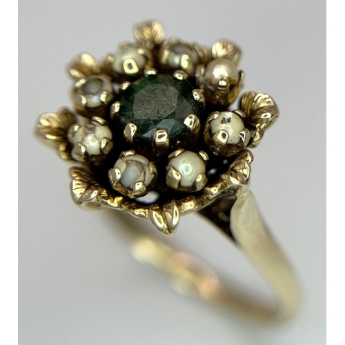 376 - A 9K yellow gold emerald and pearl vintage flower ring, 0.48ct diamond weight, 4.7g total weight, si... 