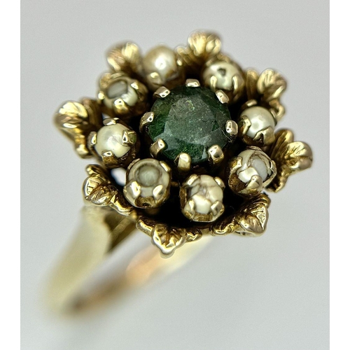 376 - A 9K yellow gold emerald and pearl vintage flower ring, 0.48ct diamond weight, 4.7g total weight, si... 