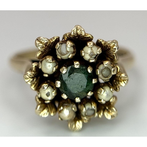 376 - A 9K yellow gold emerald and pearl vintage flower ring, 0.48ct diamond weight, 4.7g total weight, si... 