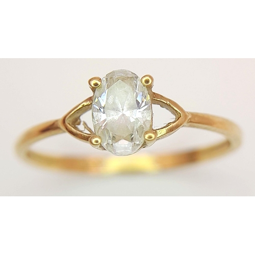 435 - Dainty 9 carat GOLD RING. Having oval cut AQUA GEMSTONE set to top. 0.98 grams. Size L 1/2 - M.