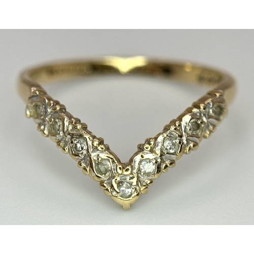 572 - A 9ct yellow gold diamond wishbone ring, size N 1/2, (dia:0.09ct), 1.5g. Ref SH1741I