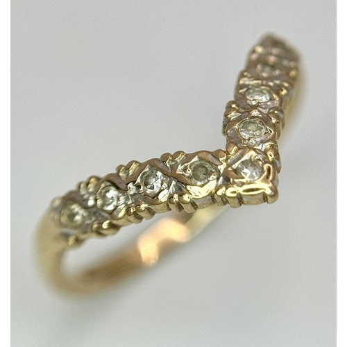 572 - A 9ct yellow gold diamond wishbone ring, size N 1/2, (dia:0.09ct), 1.5g. Ref SH1741I