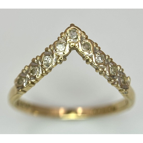 572 - A 9ct yellow gold diamond wishbone ring, size N 1/2, (dia:0.09ct), 1.5g. Ref SH1741I