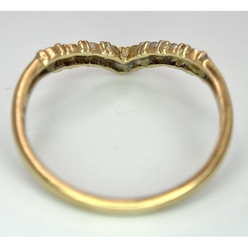 572 - A 9ct yellow gold diamond wishbone ring, size N 1/2, (dia:0.09ct), 1.5g. Ref SH1741I