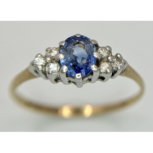 579 - A 9K yellow gold diamond and sapphire ring, 0.10ct diamond weight, 0.35ct sapphire weight, size K 1/... 