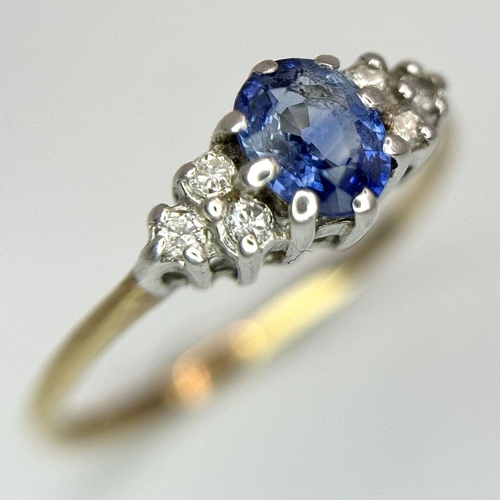 579 - A 9K yellow gold diamond and sapphire ring, 0.10ct diamond weight, 0.35ct sapphire weight, size K 1/... 