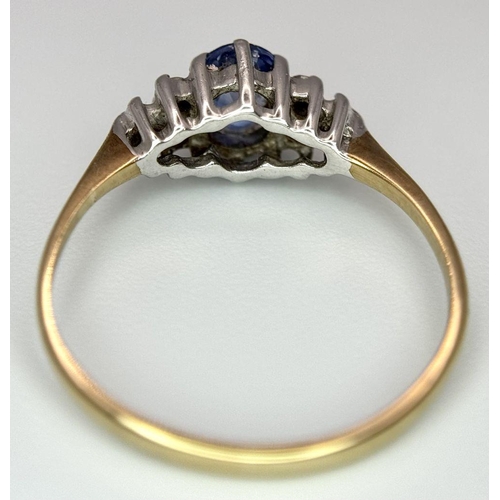 579 - A 9K yellow gold diamond and sapphire ring, 0.10ct diamond weight, 0.35ct sapphire weight, size K 1/... 