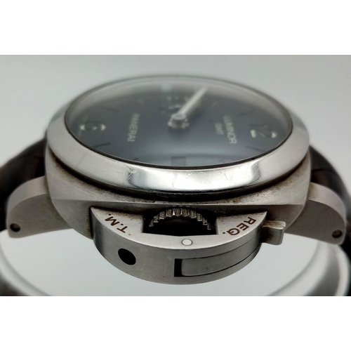 58 - A Panerai Luminor GMT Automatic Gents Watch. Black leather strap. Stainless steel case - 52mm includ... 