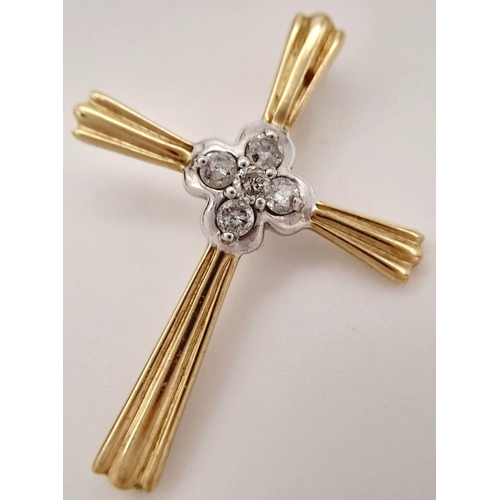 91 - Beautiful 9 carat GOLD and DIAMOND CROSS. Consisting YELLOW GOLD CROSS with WHITE GOLD centre set wi... 