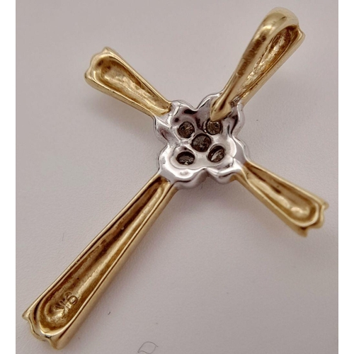 91 - Beautiful 9 carat GOLD and DIAMOND CROSS. Consisting YELLOW GOLD CROSS with WHITE GOLD centre set wi... 