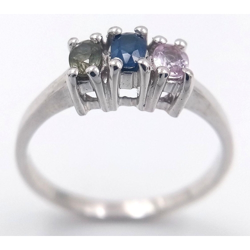 929 - A Sterling Silver Blue, Pink & Green Sapphire Trilogy Ring Size P1/2. Set with three 5mm Length Oval... 