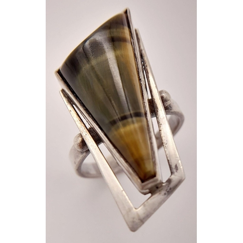 942 - A  Vintage Sterling Silver Falcon’s Eye Set Ring Size O. Set with a 2.6cm Long Fancy Triangular Cut ... 