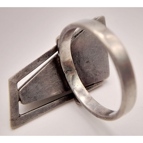 942 - A  Vintage Sterling Silver Falcon’s Eye Set Ring Size O. Set with a 2.6cm Long Fancy Triangular Cut ... 