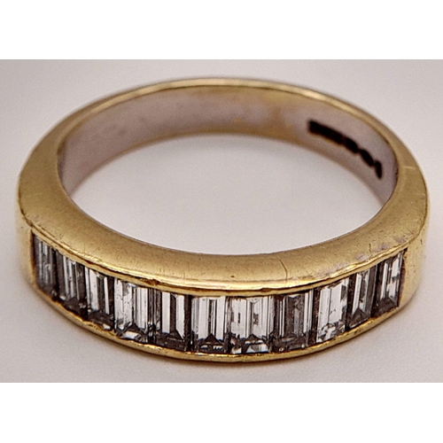 125 - Sensational 18 carat GOLD and DIAMOND RING. Having 11 x Emerald Cut DIAMOND BAGETTES set to top. Ful... 