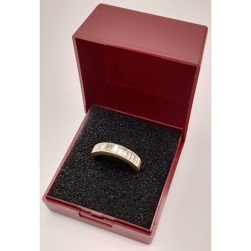 125 - Sensational 18 carat GOLD and DIAMOND RING. Having 11 x Emerald Cut DIAMOND BAGETTES set to top. Ful... 