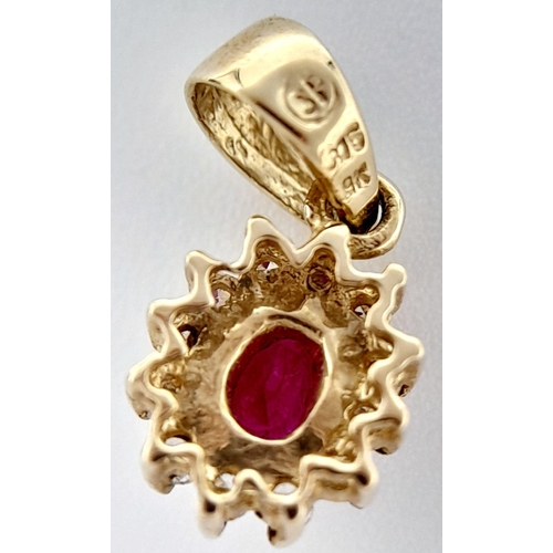 139 - An extremely petite and tasteful DIAMOND and RUBY PENDANT set in 9 CARAT GOLD. Consisting a nice qua... 