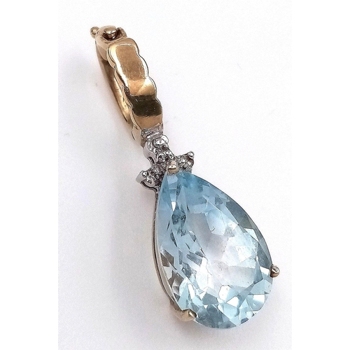 167 - Impressive  9 carat GOLD,  PEAR CUT BLUE TOPAZ PENDANT. DIAMOND DETAIL set to top. Beautifully facet... 