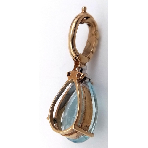 167 - Impressive  9 carat GOLD,  PEAR CUT BLUE TOPAZ PENDANT. DIAMOND DETAIL set to top. Beautifully facet... 